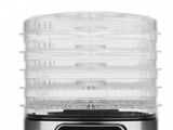 a close up of a food dehyzer machine on a white background