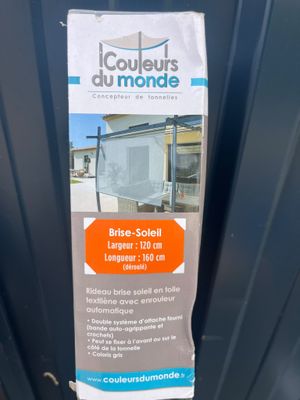 a sign on the door of a building that says it is for sale