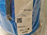a bag of luggage that is wrapped up on a counter
