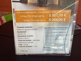 a sign on the table that says it is for sale