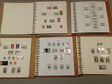several different types of stamps are displayed on a book