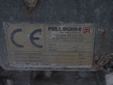 a label on the back of a machine that is sitting on the ground