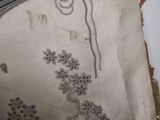 a close up of a piece of fabric with a design on it
