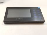 an image of a black electronic device sitting on top of a table