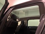 a view of the inside of a car with the door open