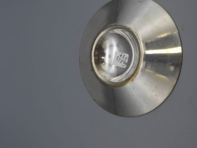 a close up view of a light on a wall
