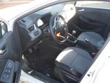 a car that is parked in a lot with the door open