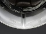 a close up of a helmet on a black background