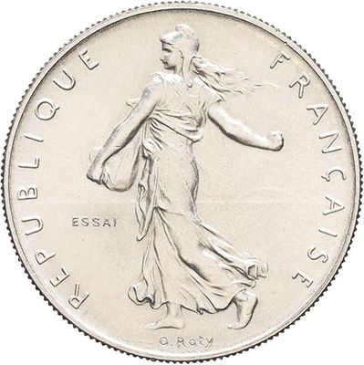 an image of a silver coin with a woman walking on it
