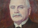 tableau représentant un homme en costume-cravate, portant une moustache
