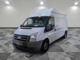 a picture of a white van parked in a large room