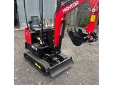 an image of a small red excavator parked in front of a building