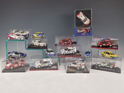 many different models of cars in a display case