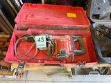 a tool box with tools in it on the floor