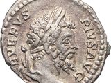 a silver coin with an image of a man on it