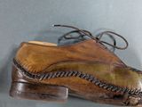 a pair of shoes that are on a wall