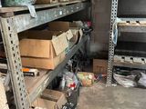 many boxes and boxes on the shelves in the garage