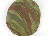 green and brown camo newsboy hat on a white background
