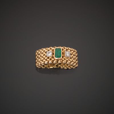 an emerald and diamond ring