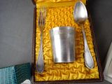 a silverware set in a box with a spoon and fork