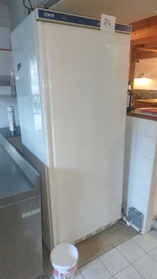 an image of a kitchen with a refrigerator in it