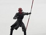 star wars figurine darth vader with lightsabed sword