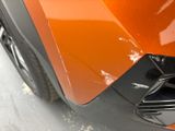 a close up of a car ' s front bumper with a star on it