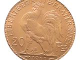 l'image d'une pièce d'or ornée d'un coq