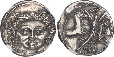a silver coin with an image of a woman and a man on it