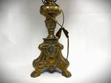 an image of a lamp that is on a stand with a cord