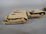 a pair of gloves that are sitting on a table