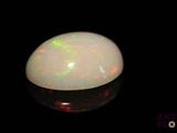 an image of a white oplite with red and green lights