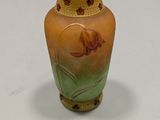 a small vase that is sitting on a table