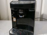 an image of a black coffee maker on a table