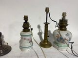 three lamps that are sitting next to each other on a table