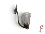 an image of a wall mounted light with a glass flower on it