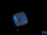 an image of a blue stone on a black background