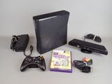 a video game system and a game controller on a table
