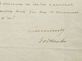 a handwritten letter on a piece of paper with writing on it
