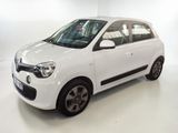 a picture of a small white car in a white room