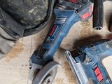 three tools that are sitting on a table