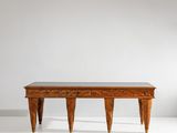 an image of a wooden table with three legs on a white surface