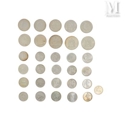 a lot of coins that are on the table
