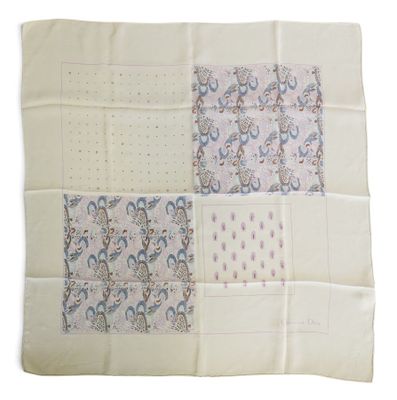 an image of a white and blue patchwork blanket