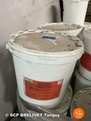 several buckets of cement sitting on top of each other in a room