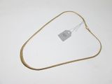 a close up of a gold necklace with a price tag on it