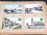 an old book with pictures of a town on it