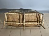two chairs that are made out of bamboo and wicker