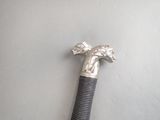 a hose with a horse head on it on a table