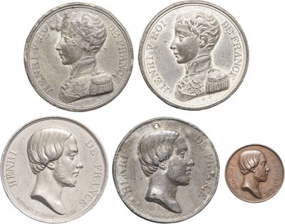 four different types of roman coins are shown on a white background